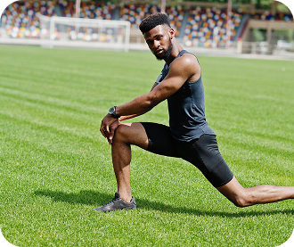 Athlete in sportswear doing stretching exercise