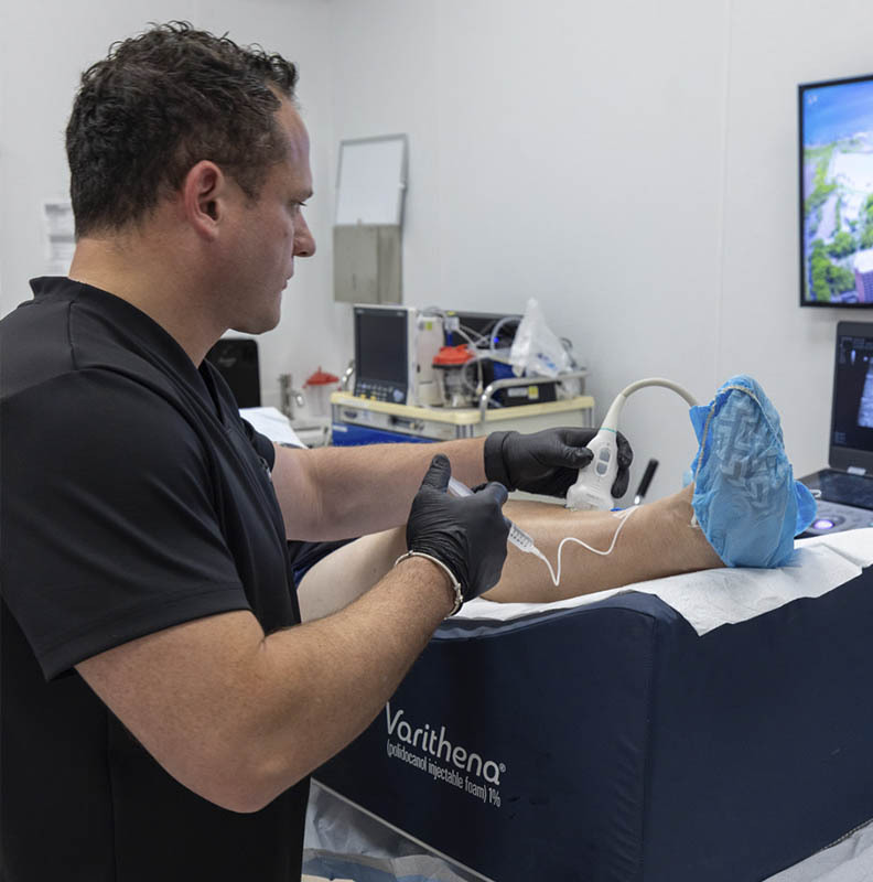 Genicular artery embolization (GAE) knee pain treatment at Astra Knee Pain Center in Brooklyn using image-guided technology.