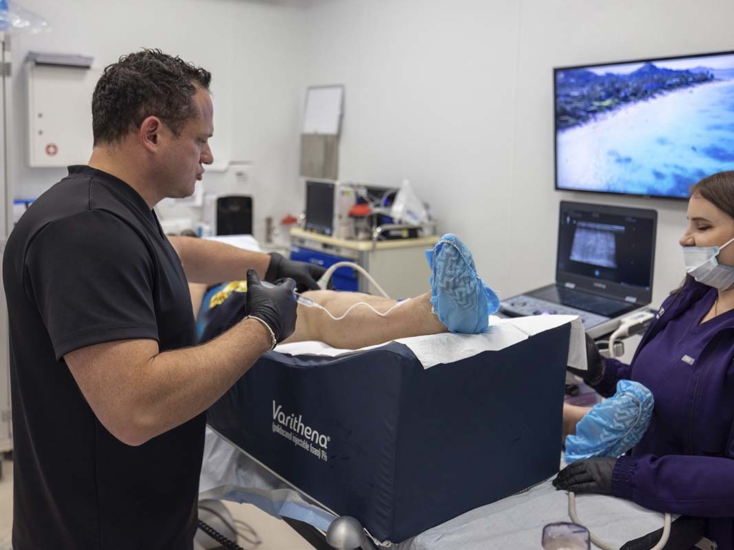Dr. George Bolotin performing a genicular artery embolization (GAE) procedure to help support faster recovery and relieve chronic knee pain at Astra Knee Pain Center.